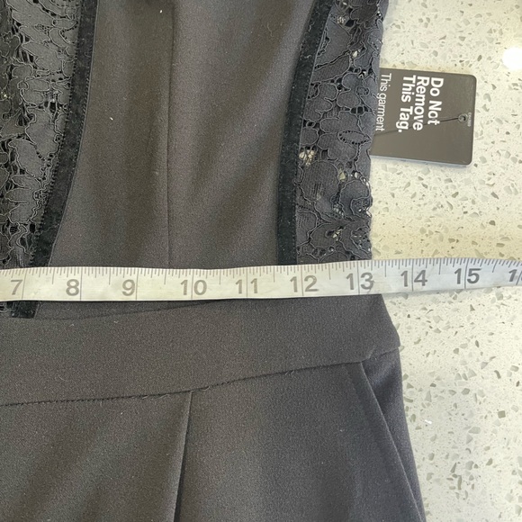 NWT EXPRESS BLACK LACE JUMPSUIT LONG SLEEVE VELVET TRIM
Size 4 - Picture 13 of 13